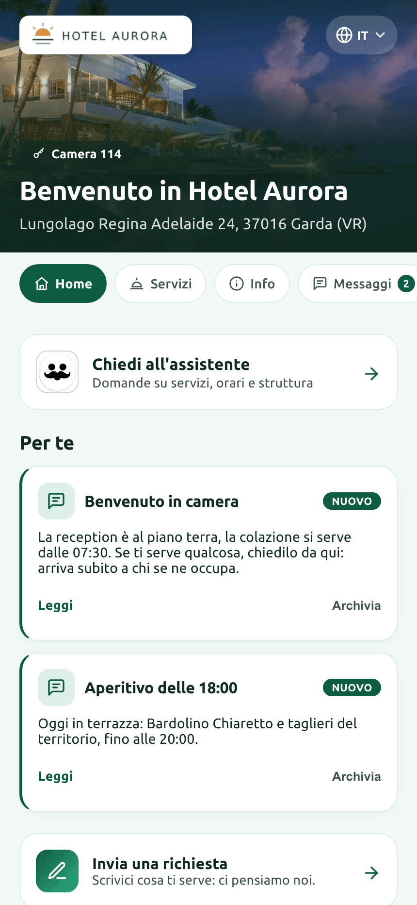 The guest app just opened: the property's cover image with the room number, the field to ask the assistant and two messages from reception.